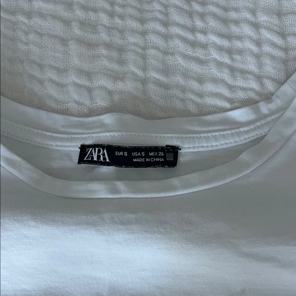 White Zara blouse with puff sleeves and rhinestones